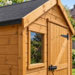 Close-up of the tongue-and-groove cladding and window frame of the Brookmere shed