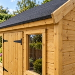 Close-up of the shiplap cladding, T-hinge and window of the Oakridge workshop