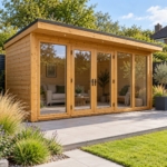 Thornbury 12x8 contemporary pent summerhouse beside a modern patio