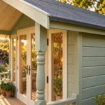 Close-up of the painted cladding, window frame and balustrade of the Willowbank summerhouse